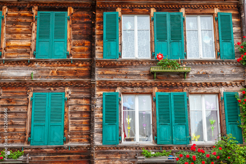 Wooden rustic swiss chalet facade in Interlaken, Switzerland