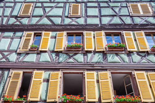 Colmar alsatian architecture at springtime with flowers, Eastern France photo