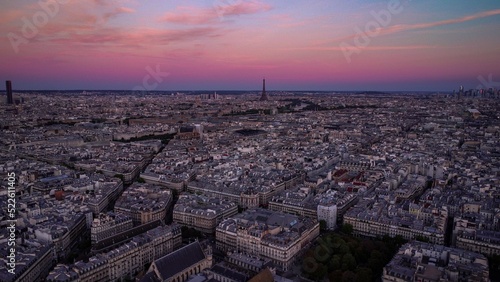 Aerial panoramic view of the Eiffel Tower, Montparnasse, la Defense and the Arc de Triomphe at sunrise in Paris, capital of France, Europe. 4K Mavic Mini 2 drone shot