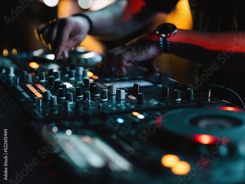 a dj playing music in a nightclub
