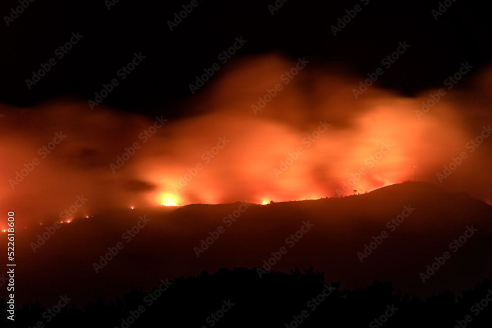 Naklejka premium fire the mountains in Arosa