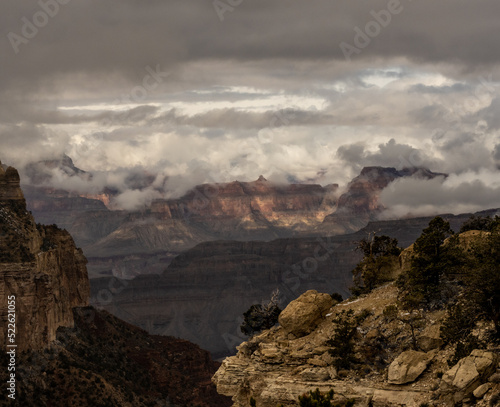 Clouds Waft in and out of the Arms of the Grand Canyon © kellyvandellen