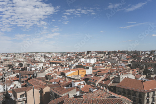 Panoramic view of the city of Salamanca desde lo alto de la iglesia on a summer day with the sky almost clear and bluish.