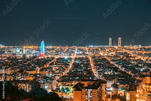 Canvas Print Barcelona skyline aerial at night view of city lights from Bunkers del Carmel, E