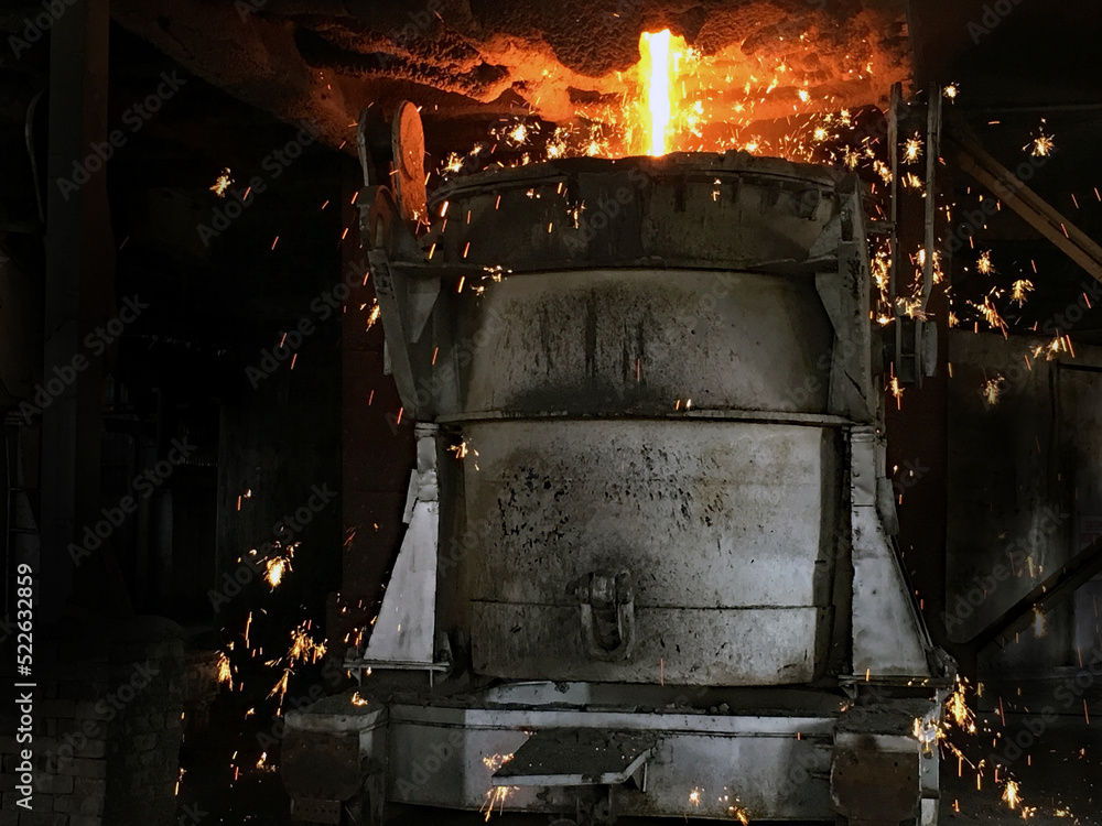 Hot Metal Ladle of being filled with molten iron in a steel industry.