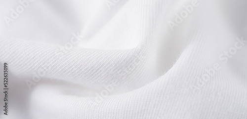 white cotton fabric texture background. Creases of cloth and cotton. photo