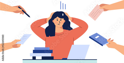 Business woman is holding her hair under stress during work photo
