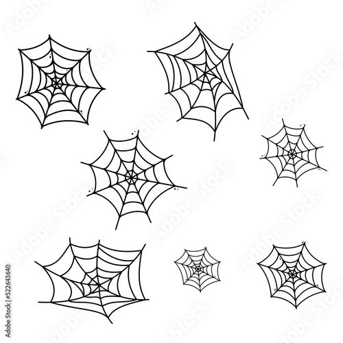 Black spider webs on the white background.