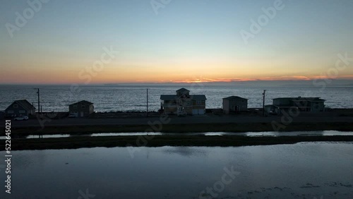 Aerial shot of homes on West Beach Road on Whidbey Island at sunset. photo