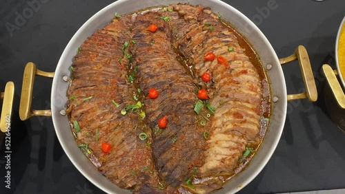 Sliced baked meat served in a restaurant self service buffet
