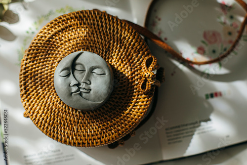 фотографія Gray candle in the shape of moon and sun. Top view