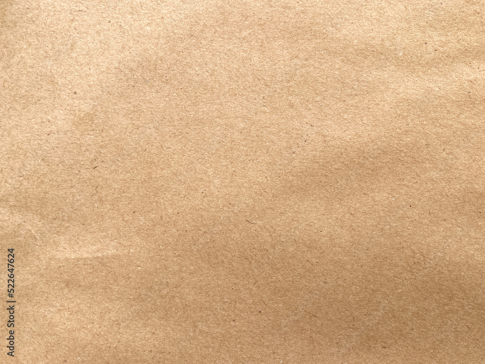 Close up crumpled brown paper texture and background with copy space Close up crumpled brown paper texture and background with copy space