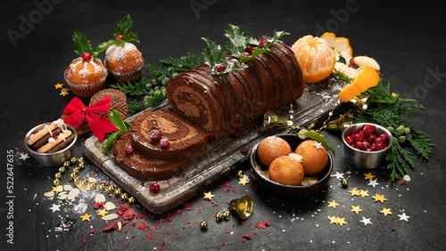 Tableau sur toile Chocolate yule log on dark background.
