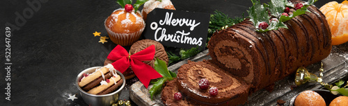 Canvastavla Chocolate yule log on dark background.