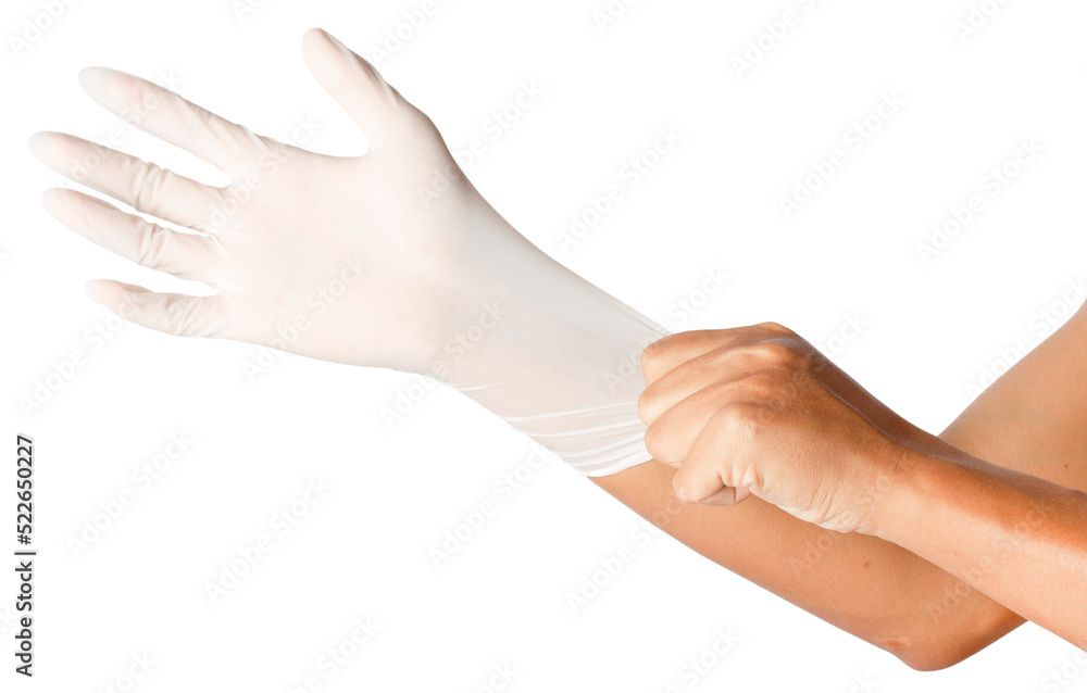 Human hand is wearing a medical glove.
