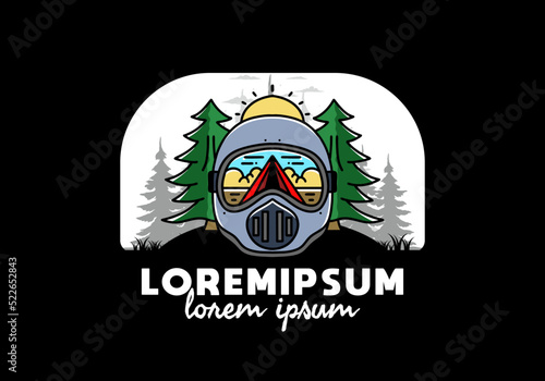 a trail helmet with a pine tree beside