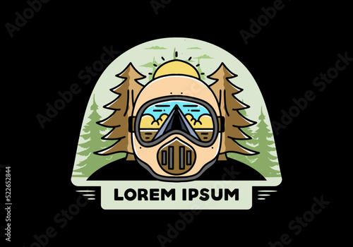 a trail helmet with a pine tree beside