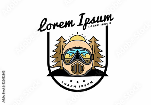 a trail helmet with a pine tree beside