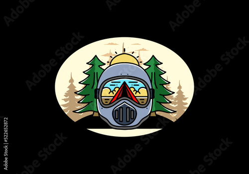 a trail helmet with a pine tree beside