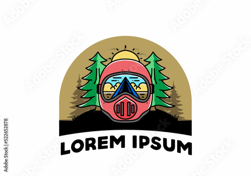 a trail helmet with a pine tree beside