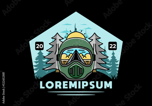a trail helmet with a pine tree beside