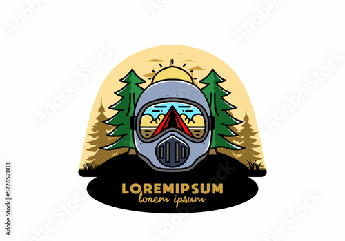 a trail helmet with a pine tree beside