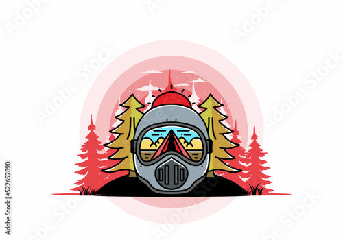 a trail helmet with a pine tree beside