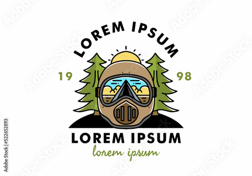 a trail helmet with a pine tree beside