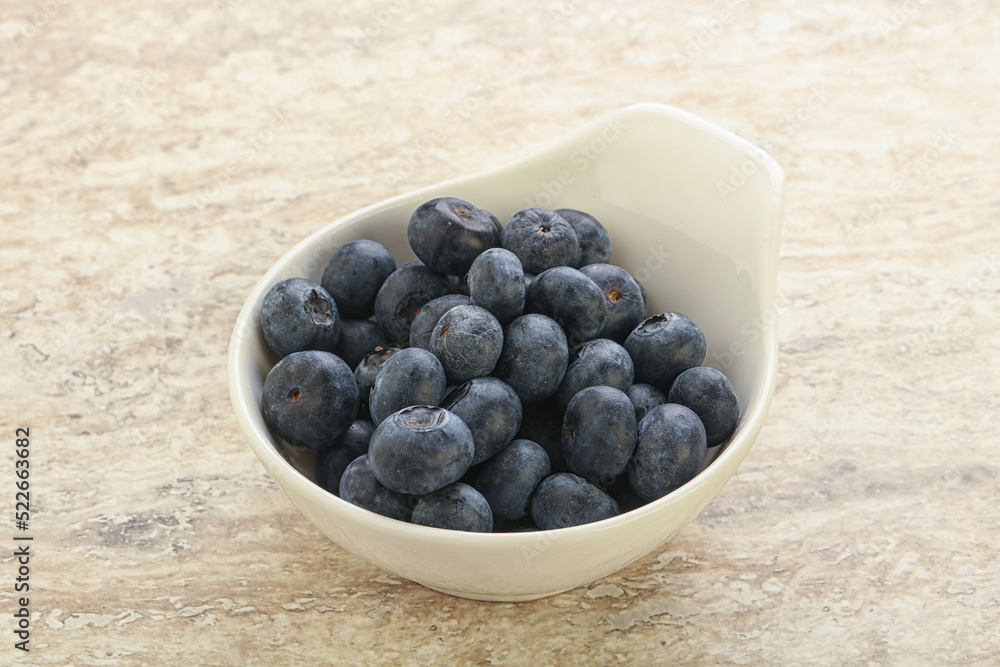 Sweet ripe blueberry heap in the bowl