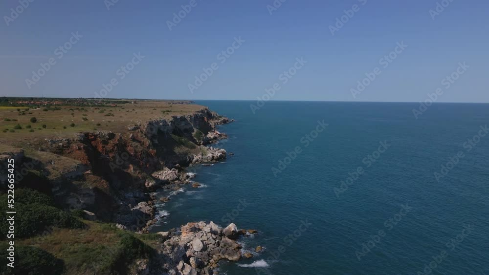 A drone shot of picturesque blue sea coastline with natural reserve. A running shot of beautiful sea A drone shot of picturesque blue sea coastline with natural reserve. A running shot of beautiful sea