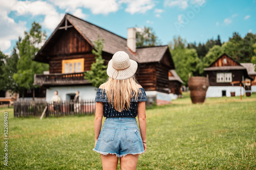 Canvas Print Stara Lubovna Castle and an open air folk museum, Slovakia Young woman tourist traveler