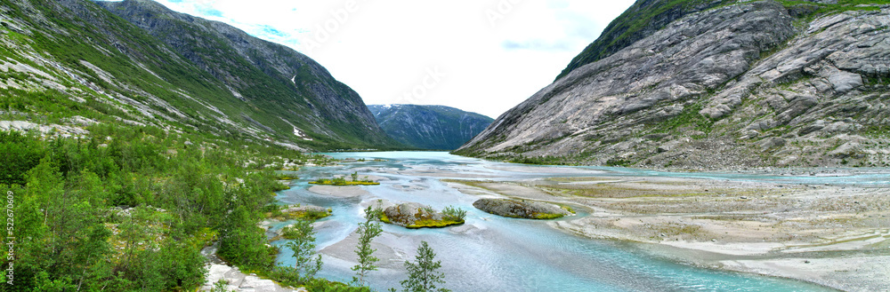 Jostedalsbreen glacier river Nigardsbrevatnet Nigardsbreen part in Norway Europe with blue ice aerial view panorama