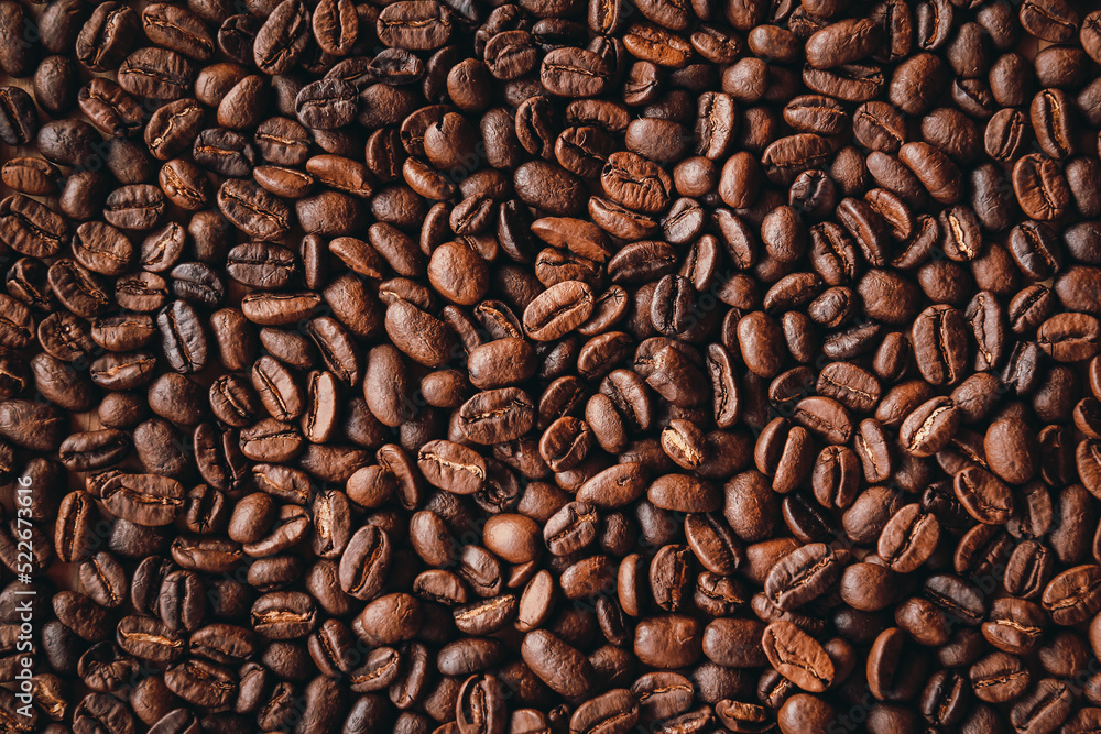 Fototapeta premium Close up of roasted coffee beans background