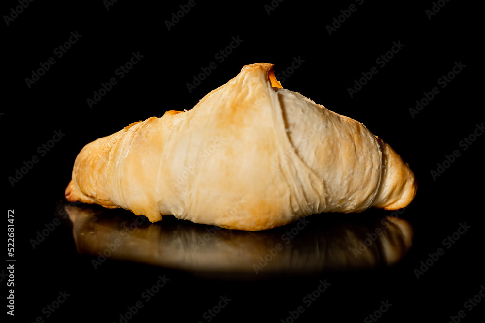 Baked croissant on tray in electric oven - close up view. French cuisine, homemade bakery, breakfast, food, cooking and pastry concept