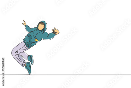 Single continuous line drawing of young energetic hip-hop dancer man on hoodie practice break dancing on street. Urban generation lifestyle concept. Trendy one line draw design vector illustration