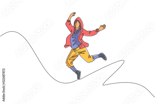 One continuous line drawing of young sporty break dancer man show hip hop jumping dance style in the street. Urban lifestyle sport concept. Dynamic single line draw design vector graphic illustration