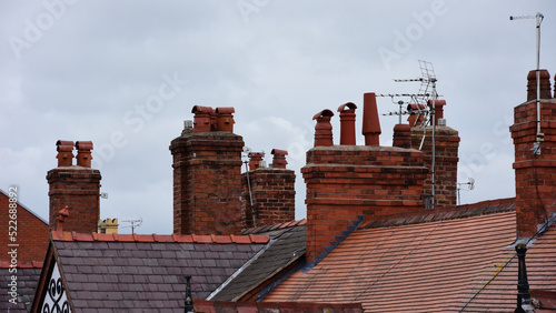 Clay chimney pots on rooftops