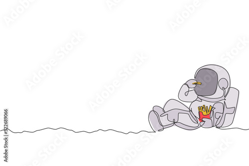 One continuous line drawing of cosmonaut laying relax on moon surface and eating french fries. Fantasy outer space astronaut life concept. Dynamic single line draw design vector illustration graphic