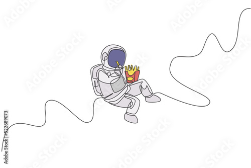 One single line drawing of astronaut flying in cosmos galaxy while eating french fries vector graphic illustration. Fantasy outer space life concept. Modern continuous line draw design
