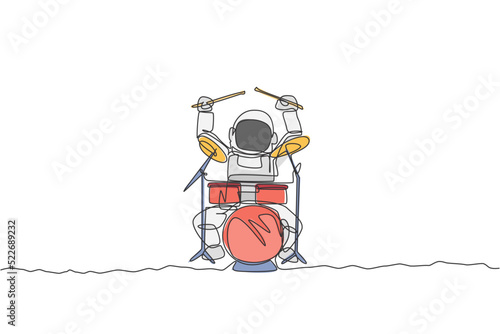 One continuous line drawing of astronaut drummer with spacesuit playing drum in moon surface. Outer space music concert concept. Dynamic single line draw design vector illustration graphic