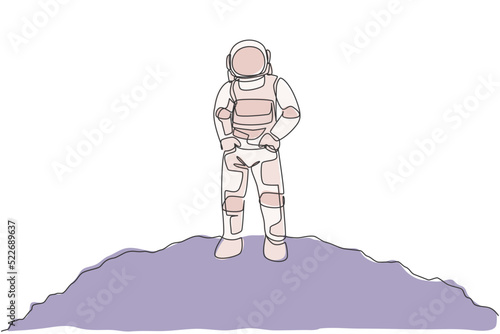 One continuous line drawing of young spaceman on spacesuit put hands in pockets in moon surface. Astronaut business office with deep space concept. Dynamic single line draw design vector illustration