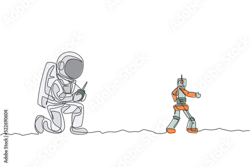 One continuous line drawing of astronaut playing robot radio control in moon cosmic galaxy. Outer space hobby and lifestyle concept. Dynamic single line draw graphic design vector illustration