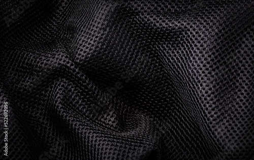 cloth, black background of closeup crumpled textile black color for background