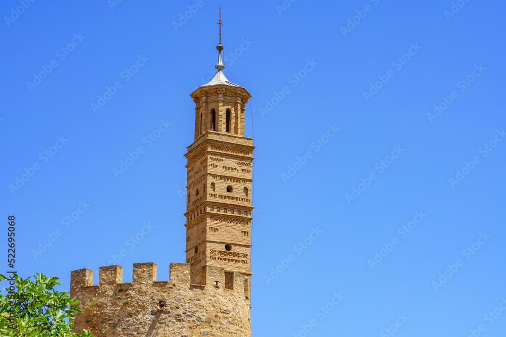 Obraz premium Mudejar-style steeple against blue sky