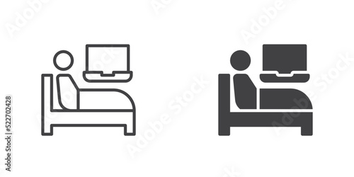 Man in bed and laptop icon
