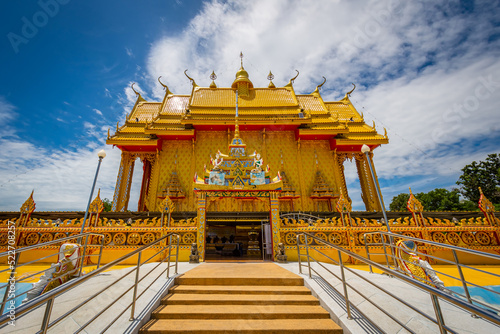 The yellow temple at Wat Tha Makok, Rayong, Thailand. photo