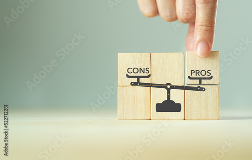 Quantitative Pros and Cons analysis concept. Concept for advantages disadvantages in business planning, evaluation and decision making. Quantifying options helps to weigh up your decision. photo