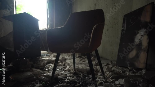 The apartment of the inhabitants after the evacuation during the bombing of a peaceful city. Left belongings of residents. Bombed apartments. Fire in the house. Traces of hits from. Mariupol. Ukraine.