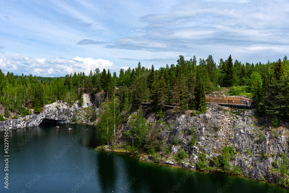 Fototapeta premium Panoramic summer view of Marble Lake in Ruskeala Park in Karelia, Russia. Popular tourist attraction.