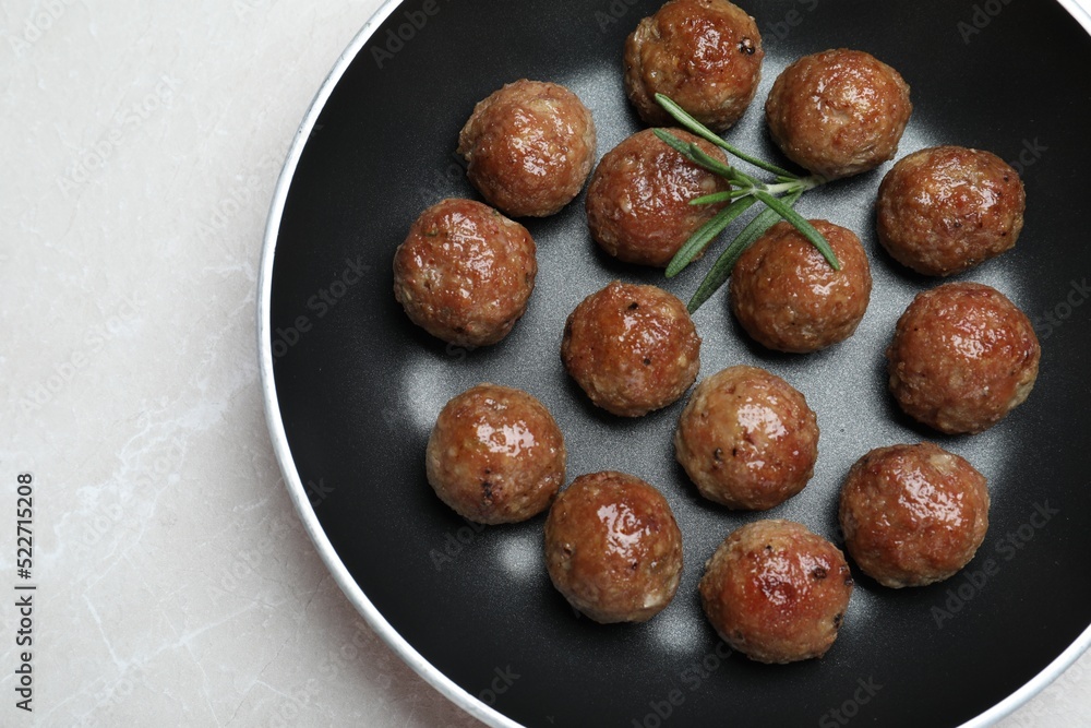 Tasty cooked meatballs on light grey marble table, top view Tasty cooked meatballs on light grey marble table, top view